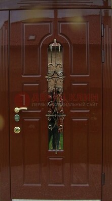 Красивая металлическая дверь со стеклом и ковкой ДСК-33 в Ивантеевке